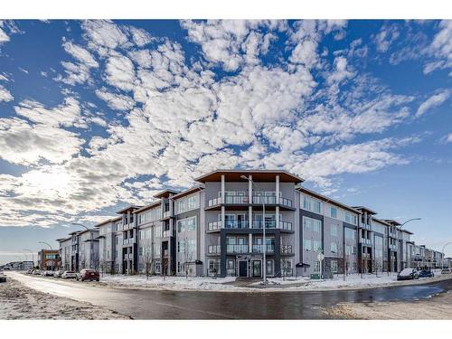 1216-681 Savanna Boulevard Ne, Calgary, AB - Outdoor With Balcony