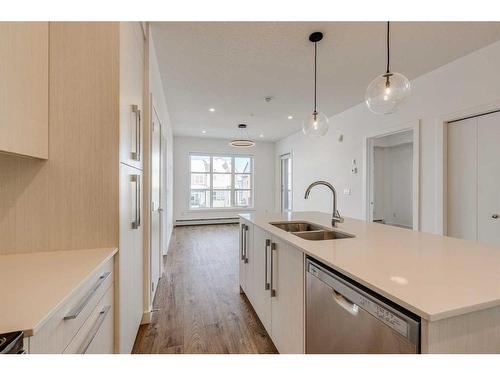 1216-681 Savanna Boulevard Ne, Calgary, AB - Indoor Photo Showing Kitchen With Double Sink With Upgraded Kitchen