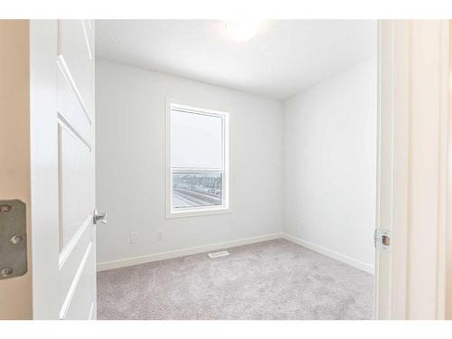 317 Redstone Boulevard Ne, Calgary, AB - Indoor Photo Showing Other Room