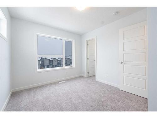 317 Redstone Boulevard Ne, Calgary, AB - Indoor Photo Showing Other Room