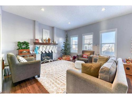 233 Ranch Close, Strathmore, AB - Indoor Photo Showing Living Room With Fireplace