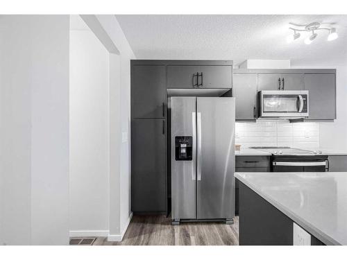 1481 148 Ave Nw, Calgary, AB - Indoor Photo Showing Kitchen With Upgraded Kitchen