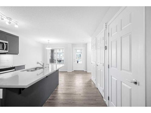 1481 148 Ave Nw, Calgary, AB - Indoor Photo Showing Kitchen With Double Sink