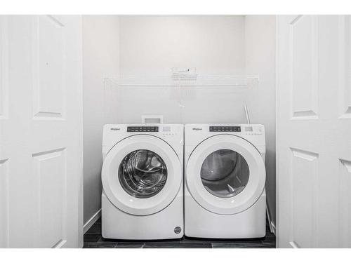 1481 148 Ave Nw, Calgary, AB - Indoor Photo Showing Laundry Room