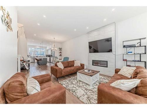 313 Masters Avenue Se, Calgary, AB - Indoor Photo Showing Living Room With Fireplace