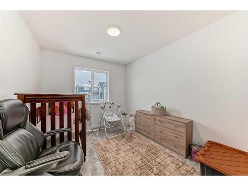 313 Masters Avenue Se, Calgary, AB - Indoor Photo Showing Bedroom