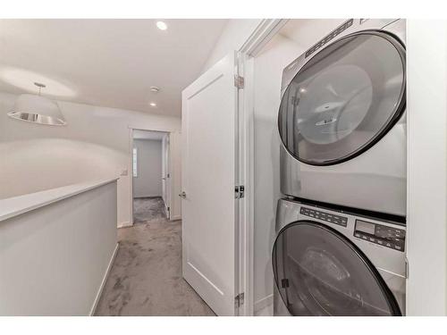 313 Masters Avenue Se, Calgary, AB - Indoor Photo Showing Laundry Room