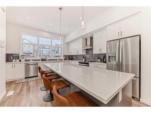 313 Masters Avenue Se, Calgary, AB - Indoor Photo Showing Kitchen With Stainless Steel Kitchen With Upgraded Kitchen