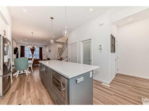 313 Masters Avenue Se, Calgary, AB - Indoor Photo Showing Kitchen With Upgraded Kitchen