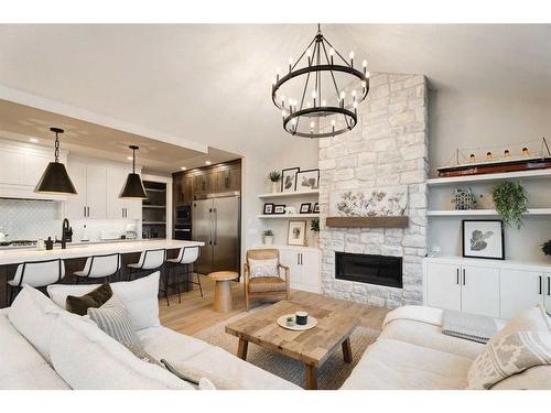 13 Sunvalley View, Cochrane, AB - Indoor Photo Showing Living Room With Fireplace