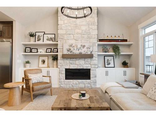 13 Sunvalley View, Cochrane, AB - Indoor Photo Showing Living Room With Fireplace