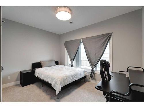 13 Sunvalley View, Cochrane, AB - Indoor Photo Showing Bedroom