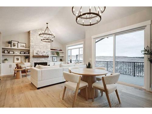 13 Sunvalley View, Cochrane, AB - Indoor Photo Showing Living Room With Fireplace