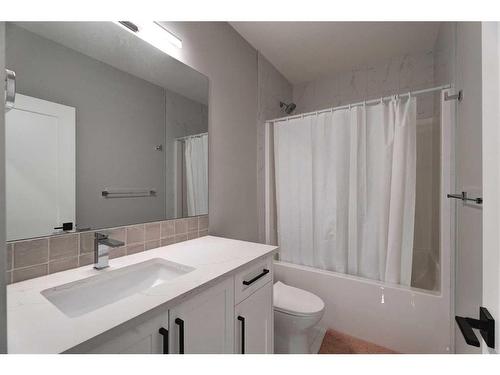 13 Sunvalley View, Cochrane, AB - Indoor Photo Showing Bathroom