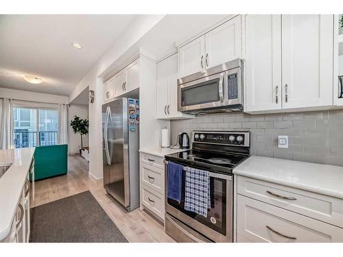 411 Nolanlake Villas Nw, Calgary, AB - Indoor Photo Showing Kitchen With Stainless Steel Kitchen With Upgraded Kitchen