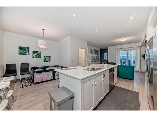 411 Nolanlake Villas Nw, Calgary, AB - Indoor Photo Showing Kitchen With Double Sink