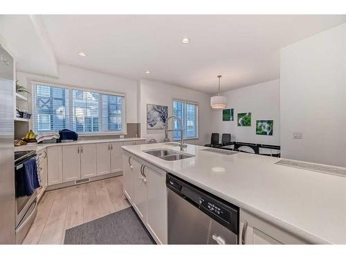 411 Nolanlake Villas Nw, Calgary, AB - Indoor Photo Showing Kitchen With Stainless Steel Kitchen With Double Sink