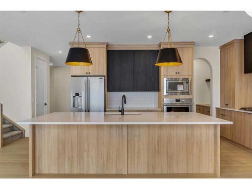 28 North Bridges Glen, Langdon, AB - Indoor Photo Showing Kitchen With Upgraded Kitchen