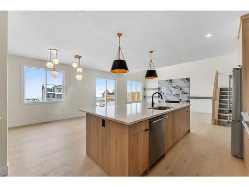 28 North Bridges Glen, Langdon, AB - Indoor Photo Showing Kitchen With Upgraded Kitchen