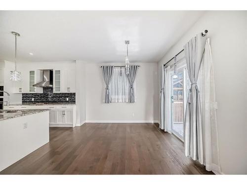 382 Kings Heights Drive Se, Airdrie, AB - Indoor Photo Showing Kitchen With Double Sink