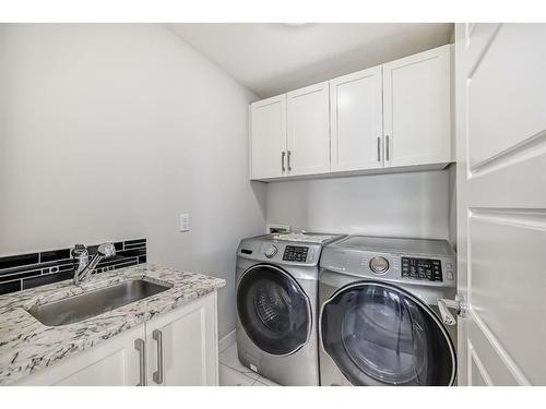 382 Kings Heights Drive Se, Airdrie, AB - Indoor Photo Showing Laundry Room