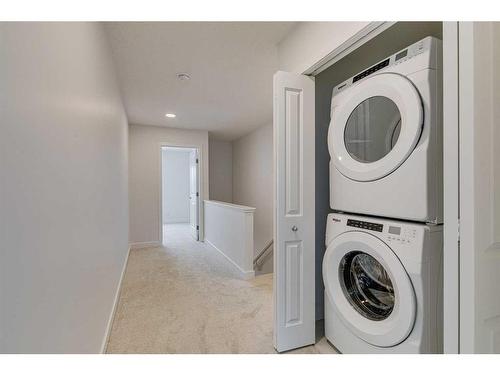 223-8500 19 Avenue Se, Calgary, AB - Indoor Photo Showing Laundry Room