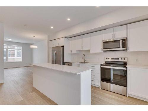 223-8500 19 Avenue Se, Calgary, AB - Indoor Photo Showing Kitchen With Upgraded Kitchen