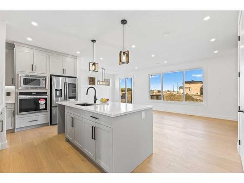 45 Waterford Crescent, Chestermere, AB - Indoor Photo Showing Kitchen With Upgraded Kitchen