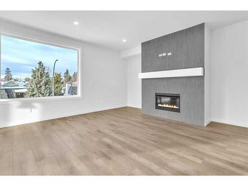 2524 17 Avenue Sw, Calgary, AB - Indoor Photo Showing Living Room With Fireplace