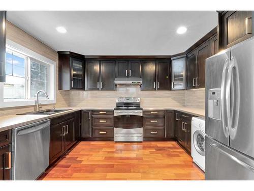 431 Cantrell Drive Sw, Calgary, AB - Indoor Photo Showing Kitchen With Upgraded Kitchen