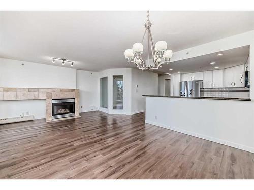 401-1108 6 Avenue Sw, Calgary, AB - Indoor With Fireplace