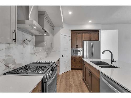 102 Herron Street Ne, Calgary, AB - Indoor Photo Showing Kitchen With Stainless Steel Kitchen With Double Sink With Upgraded Kitchen