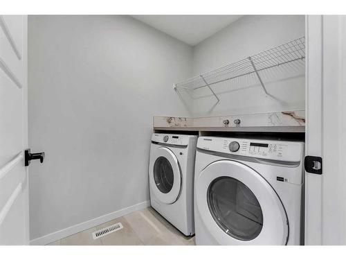 102 Herron Street Ne, Calgary, AB - Indoor Photo Showing Laundry Room