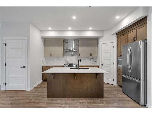 102 Herron Street Ne, Calgary, AB - Indoor Photo Showing Kitchen With Stainless Steel Kitchen With Double Sink