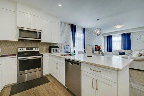 904 Sage Meadows Gardens Nw, Calgary, AB - Indoor Photo Showing Kitchen