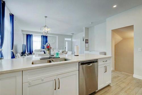 904 Sage Meadows Gardens Nw, Calgary, AB - Indoor Photo Showing Kitchen With Double Sink