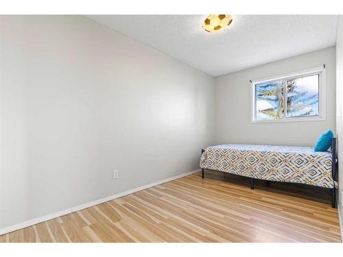 8 Coventry Lane Ne, Calgary, AB - Indoor Photo Showing Bedroom