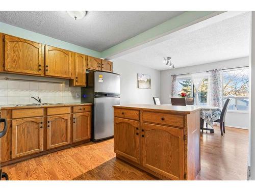 8 Coventry Lane Ne, Calgary, AB - Indoor Photo Showing Kitchen With Double Sink