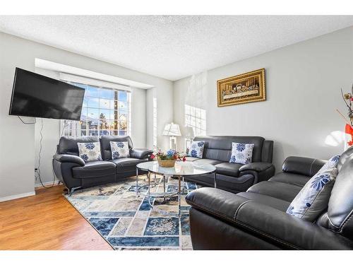 8 Coventry Lane Ne, Calgary, AB - Indoor Photo Showing Living Room