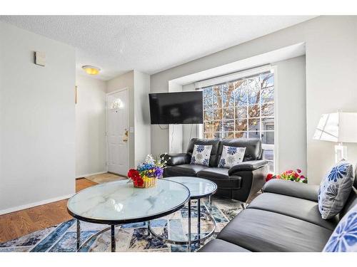 8 Coventry Lane Ne, Calgary, AB - Indoor Photo Showing Living Room