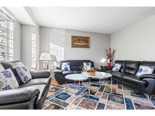 8 Coventry Lane Ne, Calgary, AB - Indoor Photo Showing Living Room