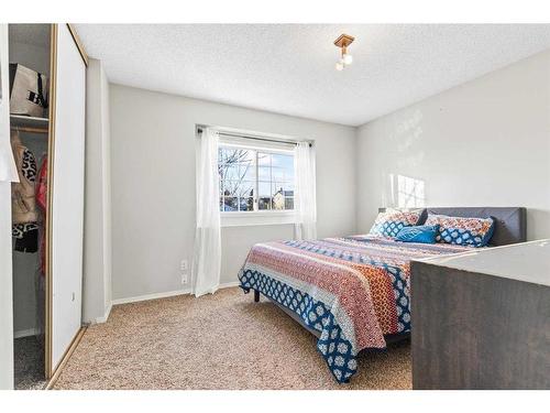 8 Coventry Lane Ne, Calgary, AB - Indoor Photo Showing Bedroom