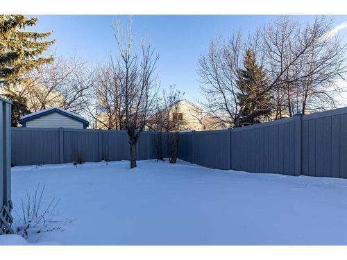 8 Coventry Lane Ne, Calgary, AB - Outdoor With Backyard