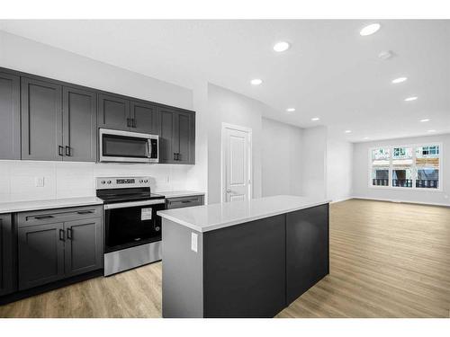 31 Legacy Passage Se, Calgary, AB - Indoor Photo Showing Kitchen