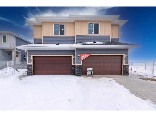 15 Waterford Street, Chestermere, AB - Outdoor With Facade