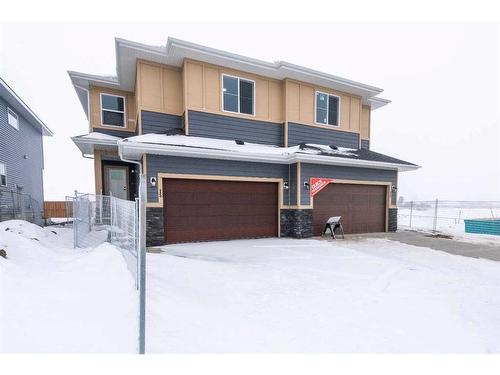 15 Waterford Street, Chestermere, AB - Outdoor With Facade