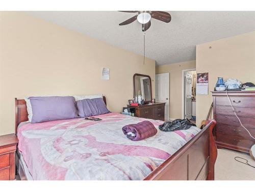 309-1010 Railway Street, Crossfield, AB - Indoor Photo Showing Bedroom