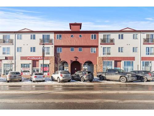 309-1010 Railway Street, Crossfield, AB - Outdoor With Facade