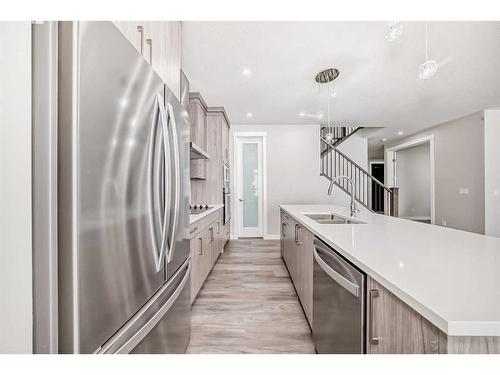 368 Watercrest Place, Chestermere, AB - Indoor Photo Showing Kitchen With Double Sink With Upgraded Kitchen