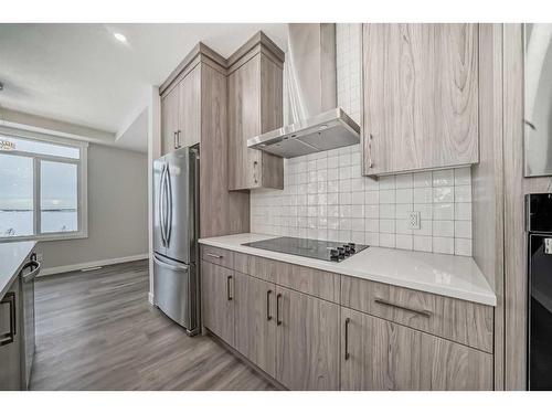 368 Watercrest Place, Chestermere, AB - Indoor Photo Showing Kitchen With Upgraded Kitchen